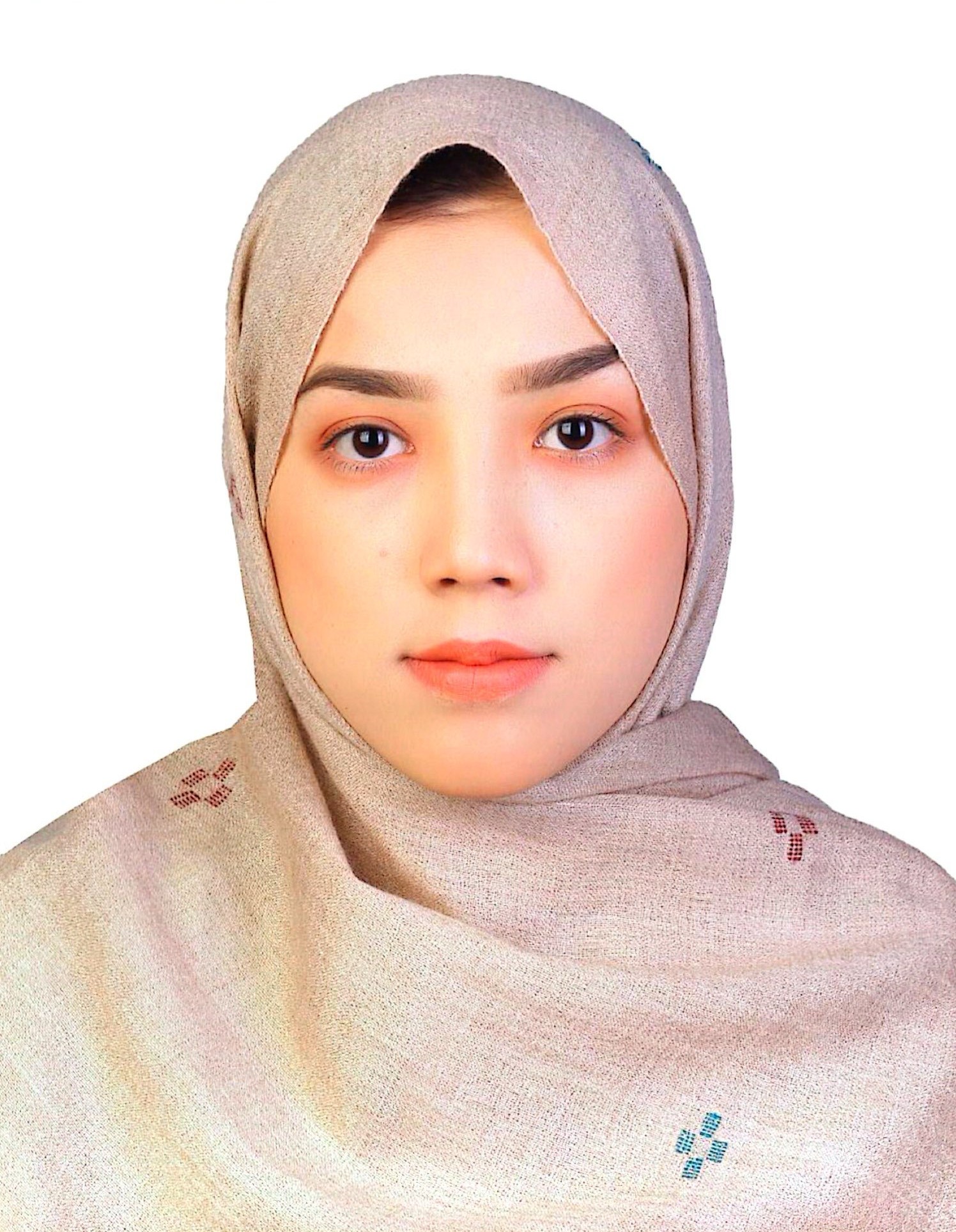 A woman wearing a hijab, representing a corporate business website design